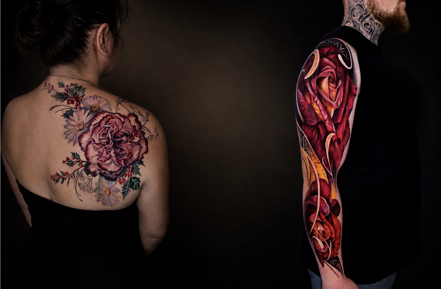 A woman with a floral back piece and a man with a rose sleeve against a dark floral backdrop — custom realism tattoos for men and women by Leilani Tattoos & Art